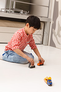 中国儿童慈善活动日设计小男孩在室内玩耍背景