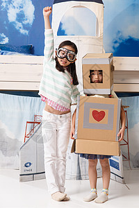 智能家电冰箱可爱的小女孩在玩太空探索背景