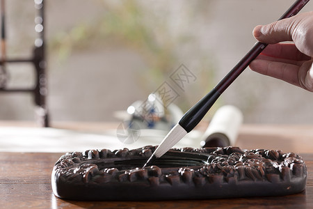 蛋糕素材文字拿着毛笔写字背景