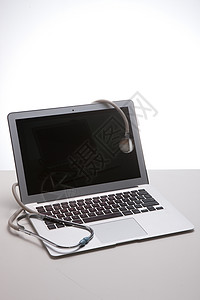 屏幕两个物体无人笔记本电脑听诊器图片