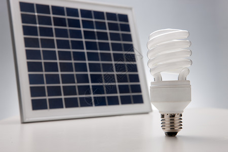 可替代能源工业太阳能电池板模型节能灯泡背景