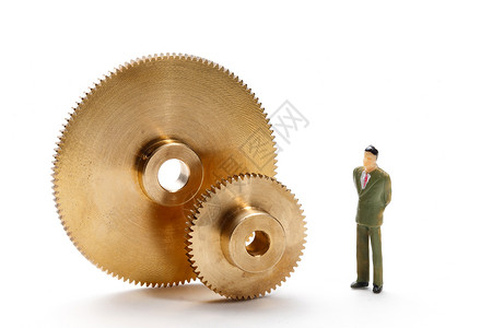 工业小素材齿轮和微型人偶背景