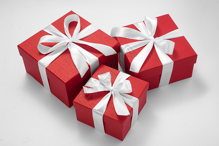圣诞概念系着丝带的礼品盒背景