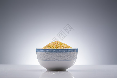 一勺小黄米营养有机食品一碗小黄米背景