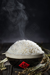 瓷器制品黑色背景传统节日一碗热气腾腾的米饭图片