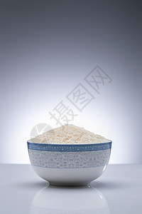 水稻农作物一碗长粒香米背景图片