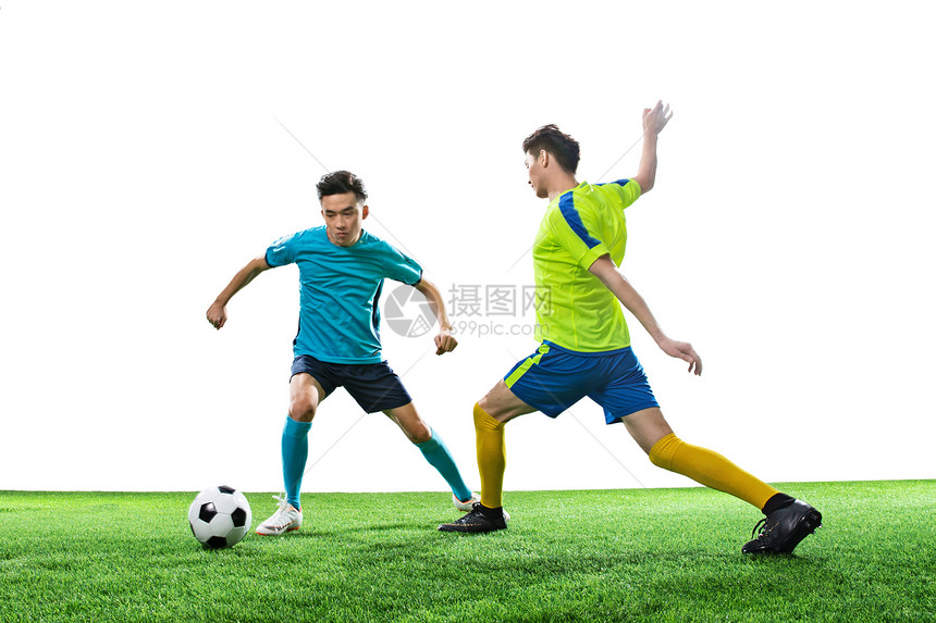 男足球运动员踢球图片