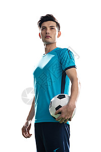 练拿着足球的运动员肖像高清图片