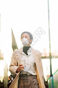 新型冠状防流感口罩戴口罩的青年女人背景图片