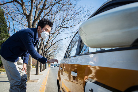 打车软件安全问题空气污染青年男人路边打出租车背景