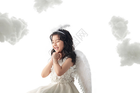 翅膀自做户内生长玩耍快乐的小天使做祈祷背景
