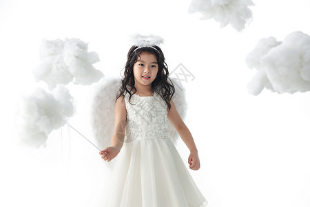 可爱的魔杖东亚天使装扮的快乐小女孩图片