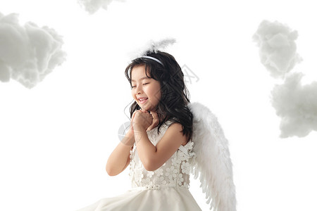 小孩许愿头饰6岁到7岁快乐的小天使做祈祷背景