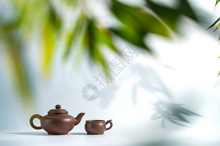 竹叶下的茶壶高清图片