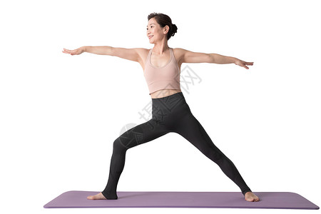 身体上分开不看镜头中年女练习瑜伽背景
