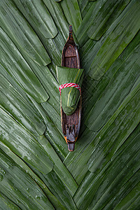 小船元素端午文化龙舟和粽子背景