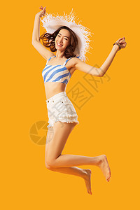 青年女人放松活力跳跃的快乐女人高清图片