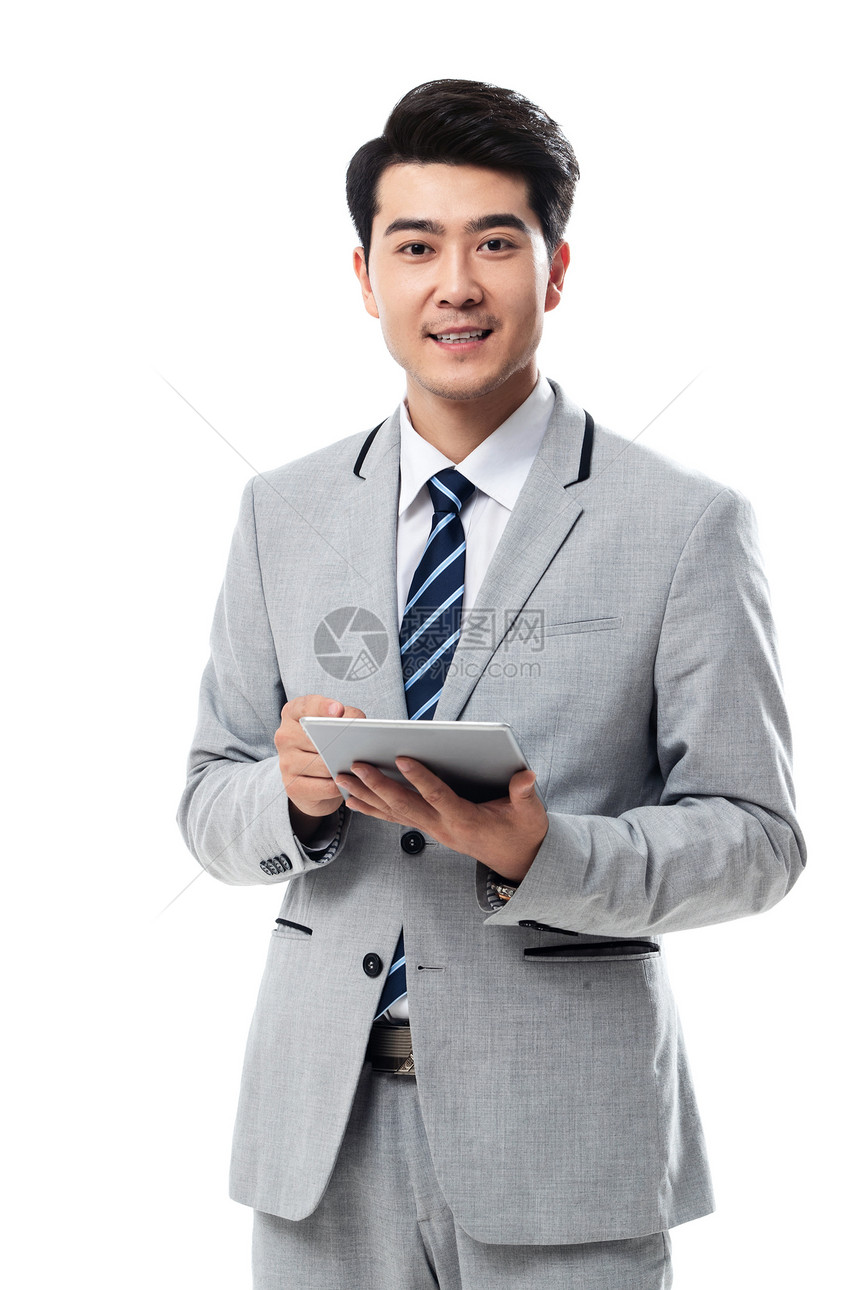 东亚通讯亚洲人拿平板电脑的商务男士图片