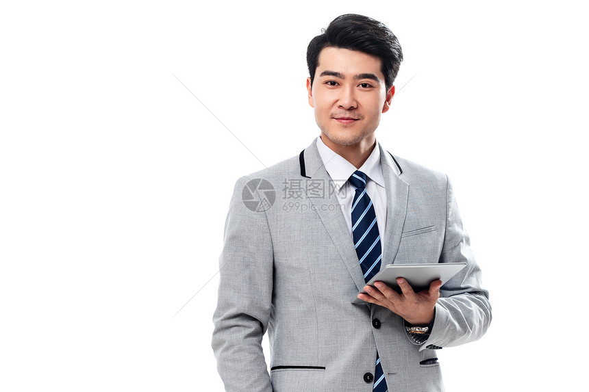 半身像成功人士白领拿平板电脑的商务男士图片