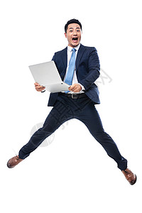 夸张30岁到34岁青年文化拿着笔记本电脑兴奋的商务男士图片