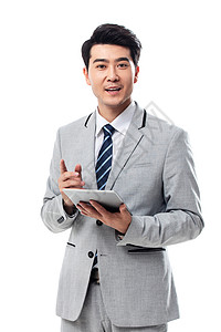 亚洲东方人20多岁拿平板电脑的商务男士图片