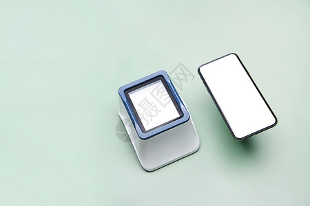 简单便捷现代发展简单手机扫码支付盒子和手机背景
