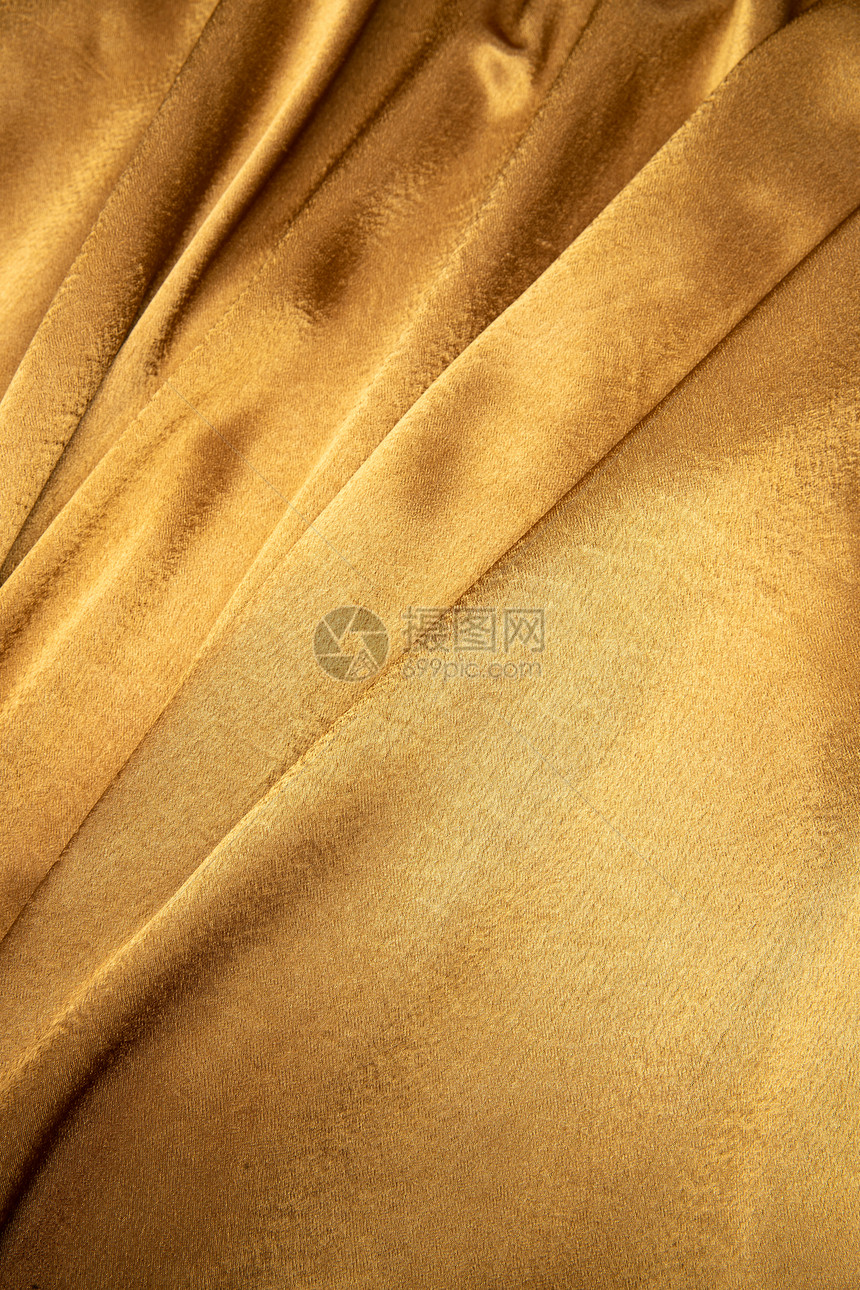 品质闪亮的棚拍金色丝绸图片