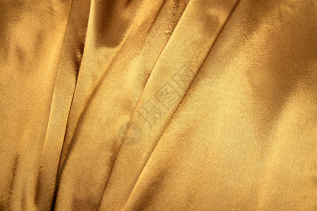 衣服褶皱锦缎褶皱水平构图金色丝绸背景