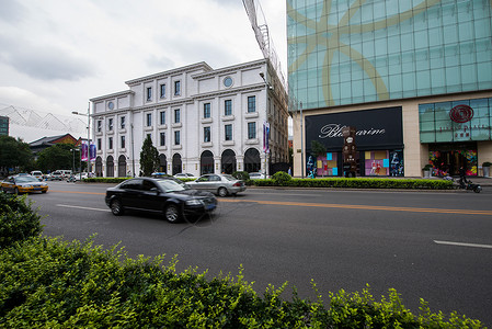 汽车燃油宝北京城市建筑购物广场背景