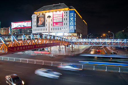 汽车广告牌北京西单商业街背景