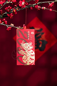 无人古典式气氛悬挂在梅花下面的红包图片