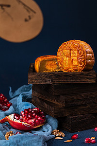 石榴枝元素中国传统节日中秋节吃月饼背景