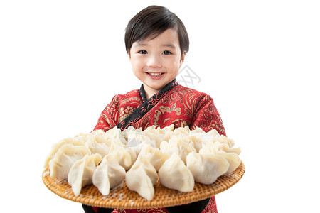 留白的饺子兴奋欢乐无忧无虑小男孩过年包饺子背景
