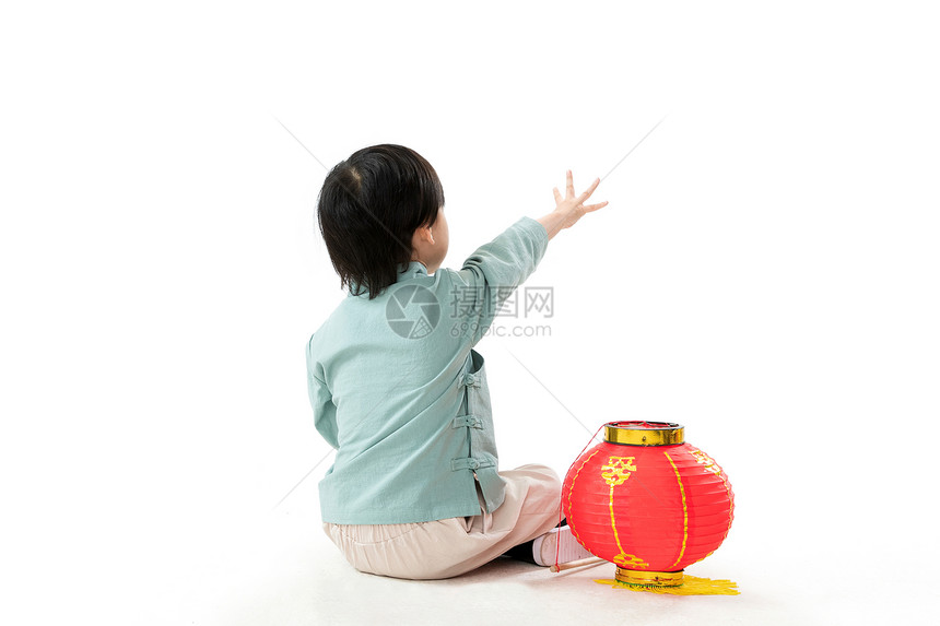 亚洲摄影坐着可爱的小男孩和红灯笼图片