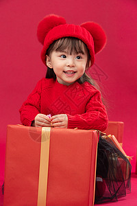 人吉祥亚洲可爱的小女孩拿着新年礼物图片