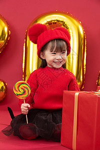 无忧无虑彩色图片童年可爱的小女孩拿着棒棒糖图片