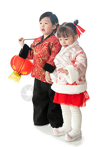 红色亚洲童年庆祝新年的两个小朋友拿着红灯笼图片