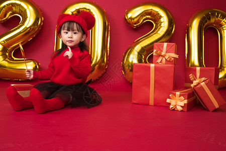 鼠年包装盒裙子影棚拍摄节日可爱的小女孩过新年背景
