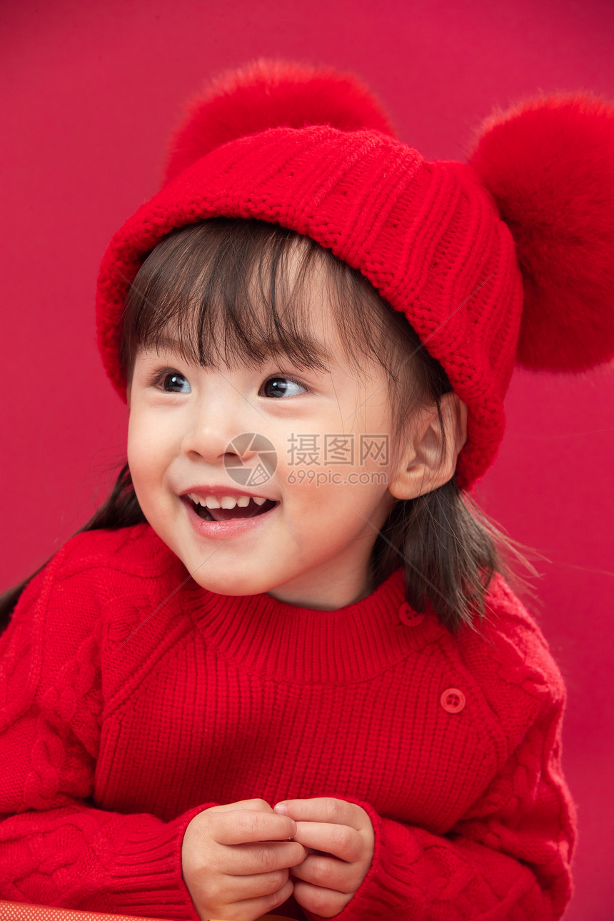 拜年庆祝半身像穿红衣戴红帽的可爱小女孩图片