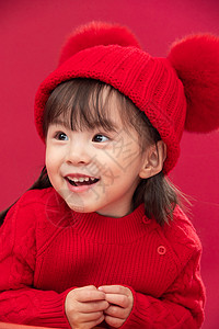 拜年庆祝半身像穿红衣戴红帽的可爱小女孩背景