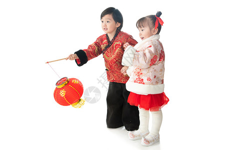 传统文化亚洲欢乐庆祝新年的两个小朋友拿着红灯笼图片