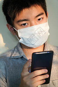 微信医疗戴口罩的男孩看手机背景