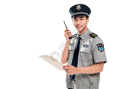 能力无线电话机制服年轻男保安在工作图片