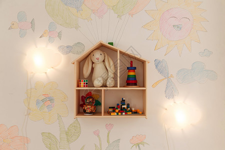 毛绒玩具兔子简单架子彩色图片室内墙壁背景