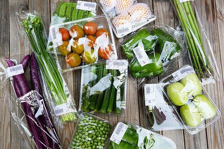 购物塑料袋干净新鲜蔬菜背景