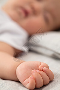 保护小孩宝宝的手特写背景