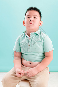 胖子表情包纯净快乐摄影小男孩的可爱表情背景
