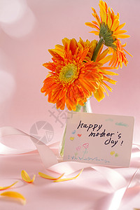 橙色立体字母母亲节感谢贺卡和花朵背景
