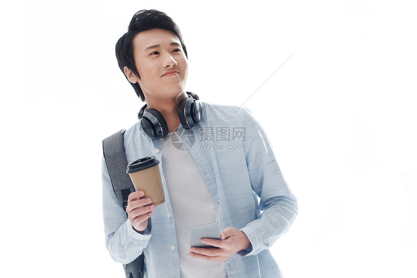 背景分离通勤者活力男青年拿着咖啡杯去上班图片
