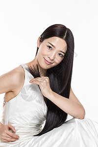 仅一个女人大半身亚洲人有着柔顺的长发的美女图片